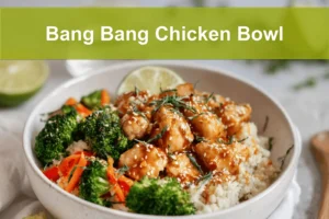 Bang Bang Chicken Bowl with tender-cooked chicken pieces rice cauliflower rice vegetables zesty creamy sauce lime