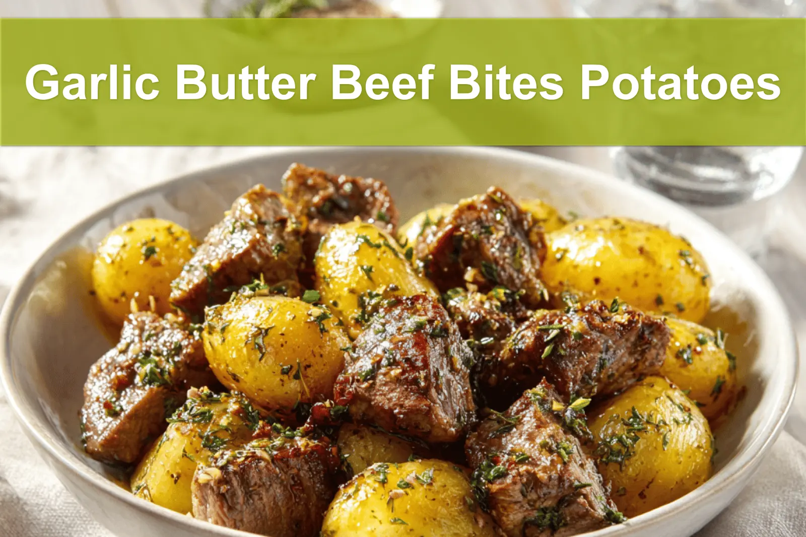 Garlic Butter Beef Bites Potatoes plated with roasted baby potatoes and garlic butter glaze