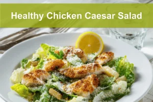Healthy Chicken Caesar Salad with breaded chicken pieces panko crumbs romaine lettuce and spicy honey drizzle