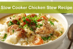 Slow Cooker Chicken Stew Recipe warm bowl on white cloth napkin with glass of water