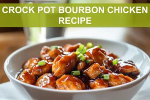 CROCK POT BOURBON CHICKEN RECIPE glazed chicken in bowl on white napkin with clear water