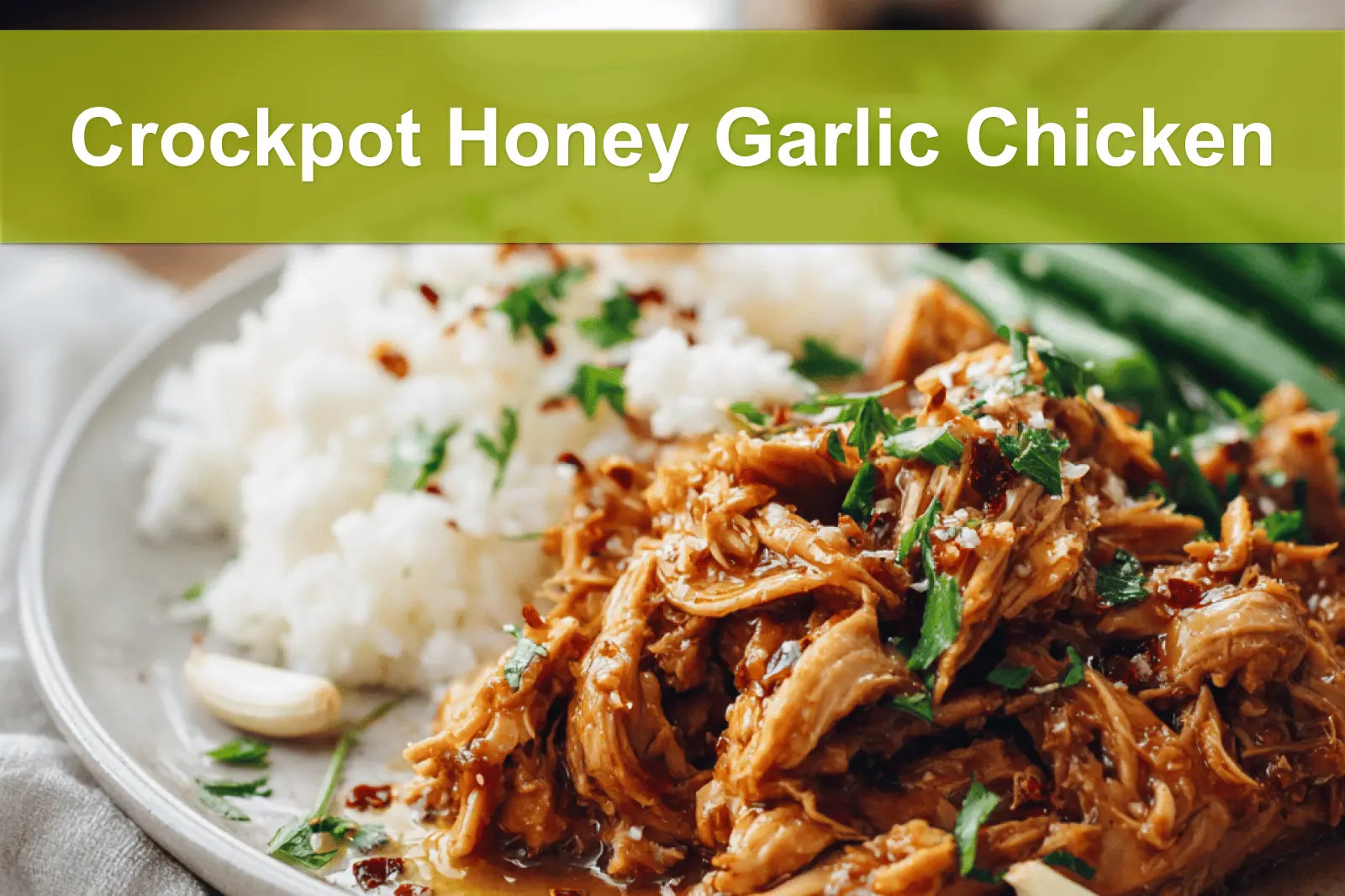 Crockpot Honey Garlic Chicken plated with rice green beans and sticky honey garlic glaze