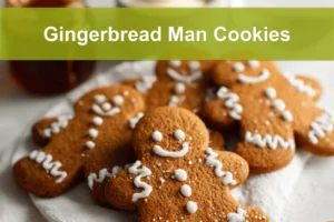 Gingerbread Man Cookies on white cloth with water glass warm festive close up