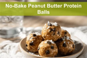 No-Bake Peanut Butter Protein Balls close up on plate with coconut and mini chocolate chips