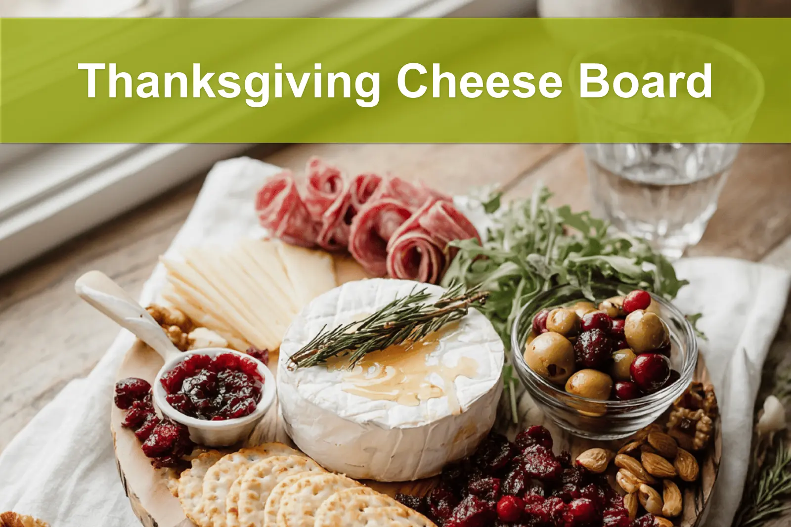 Thanksgiving Cheese Board with brie manchego white cheddar cranberry goat cheese assorted salami