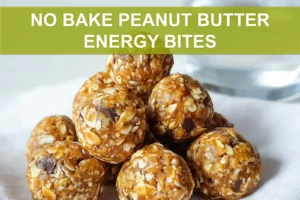NO BAKE PEANUT BUTTER ENERGY BITES on white napkin with clear glass of water warm tones