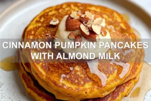 CINNAMON PUMPKIN PANCAKES WITH ALMOND MILK centered hero view, clean and uncluttered