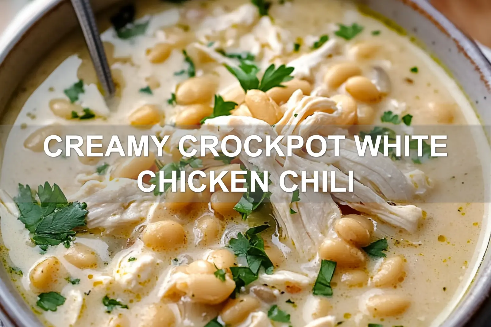Creamy Crockpot White Chicken Chili A Delicious Recipe 3 CREAMY CROCKPOT WHITE CHICKEN CHILI centered hero view, clean and uncluttered