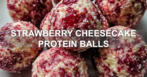 Strawberry Cheesecake Protein Balls for a Delicious Treat STRAWBERRY CHEESECAKE PROTEIN BALLS centered hero view, clean and uncluttered