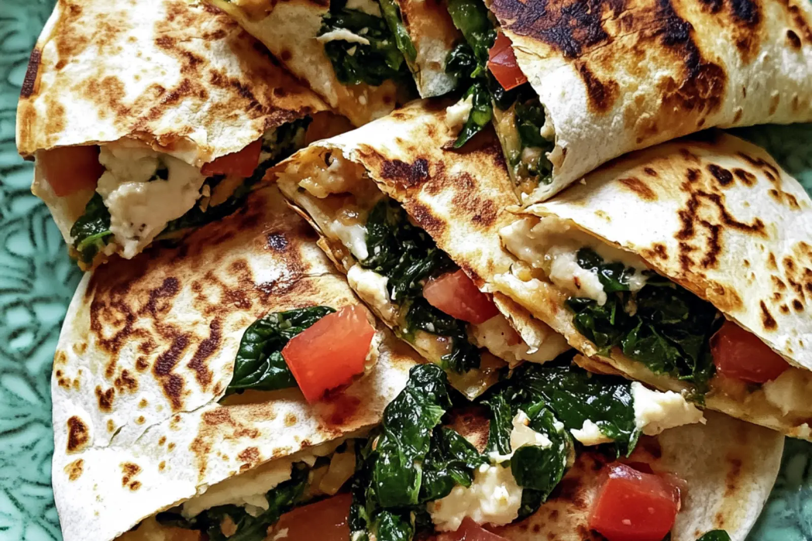MEDITERRANEAN QUESADILLAS WITH SPINACH centered hero view, clean and uncluttered
