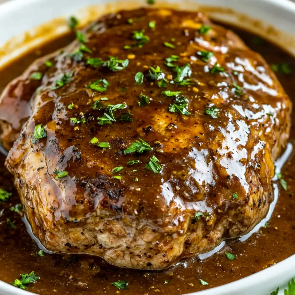 Slow Cooker Salisbury Steak Easy Comforting Dinner 2 SLOW COOKER SALISBURY STEAK centered hero view, clean and uncluttered