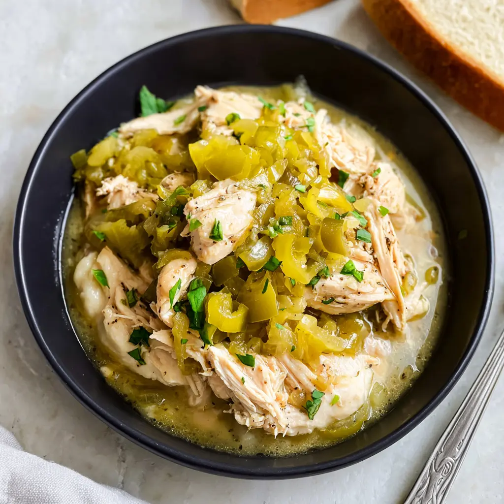 Mississippi Chicken Crockpot Pepperoncini Cozy Real Satisfying Dinner Your Family Will Love 1 Slow Cooker Mississippi Chicken Pepperoncini recipe, served and ready to eat, easy homemade dish